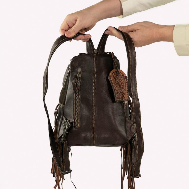 Prairie Wanderer Fringe Leather Backpack | TRAVELTELI display picture 1