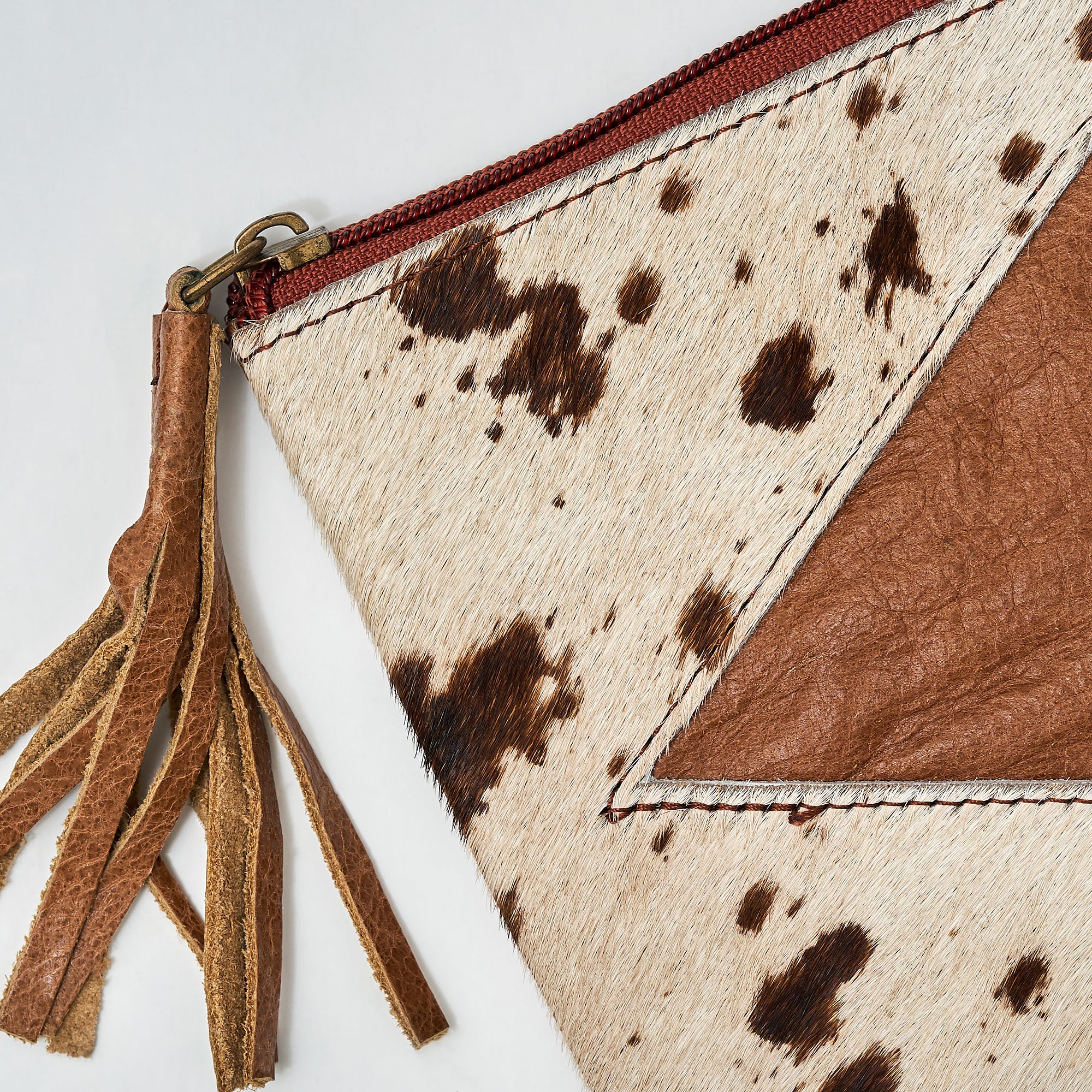 Leather Accented Cowhide Pouch